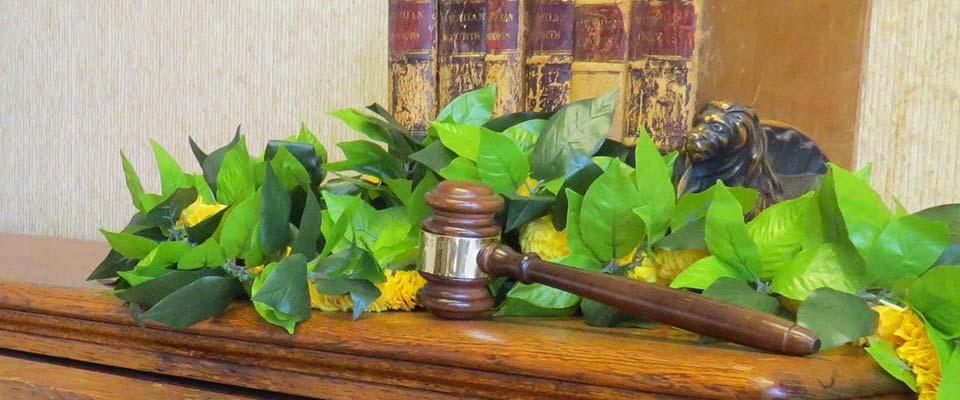 image of gavel on desk at Case Lombardi